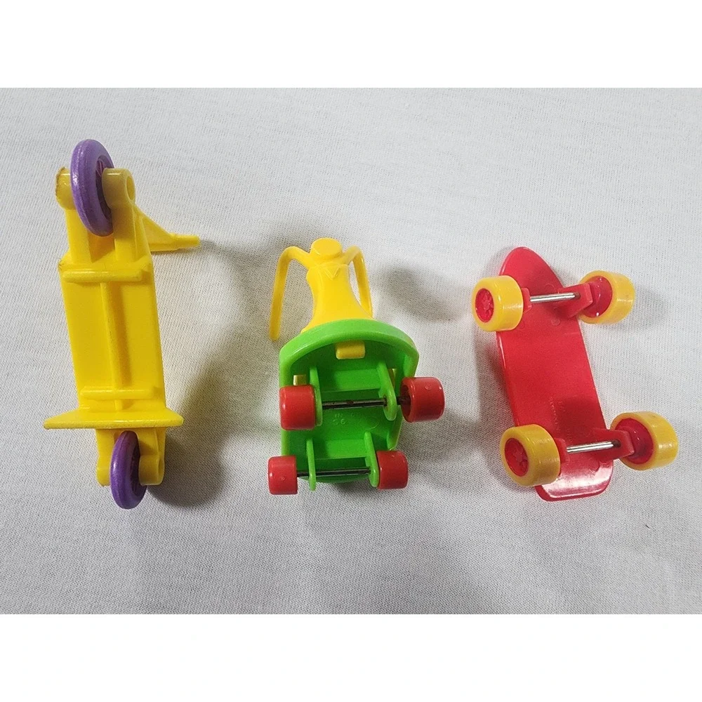 Vintage 1980s McDonalds Happy Meal Lot Garfield Muppet Babies Scooter Skateboard